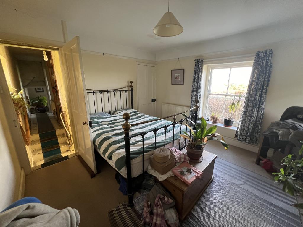Lot: 16 - DETACHED THREE-BEDROOM COTTAGE FOR IMPROVEMENT WITH PLANNING FOR EXTENSION - General view of bedroom 1